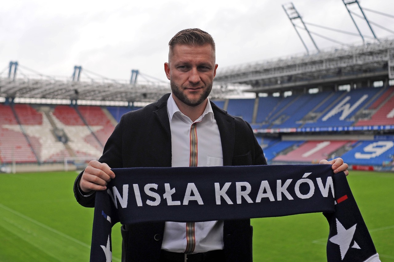 Jakub „Kuba" Blaszczykowski mit einem Schal von Wisla Krakau