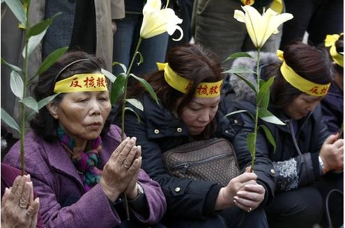 Japanische Atomkraft-Gegner in Taiwan bei einer Demonstrations- und  Gedenkveranstaltung.