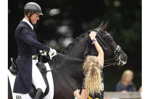 Der Champion und sein Wunderpferd Totilas. Foto: REUTERS/Ina Fassbender