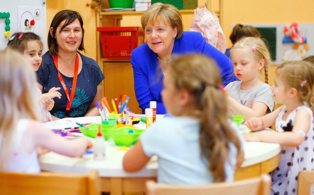 2018-07-18T113944Z_942432773_RC1A4A3CC640_RTRMADP_3_GERMANY-CHARITY-MERKEL.JPG