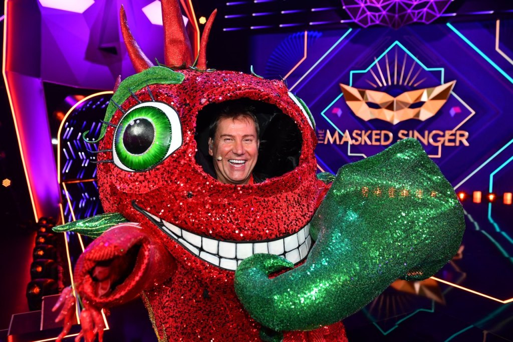 Jens Riewa bei „The Masked Singer“ als Chili verkleidet.