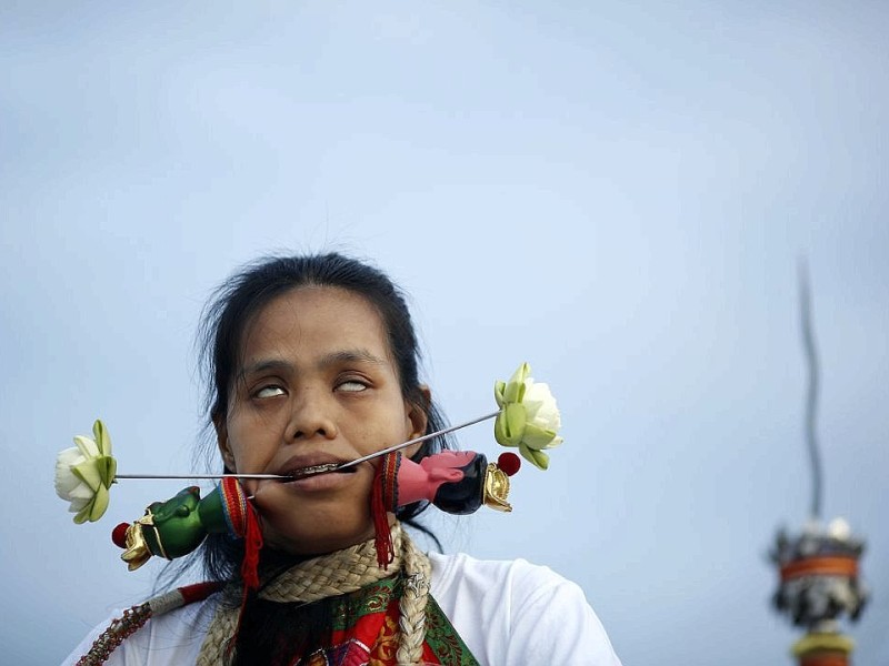 Das Vegetarier Festival auf der thailändischen Insel Phuket zieht jedes Jahr viele Gläubige und Schaulustige an.