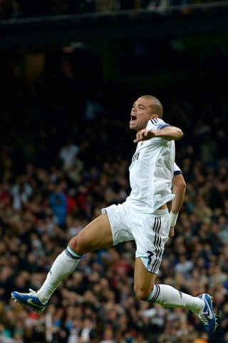 MADRID, SPAIN - NOVEMBER 06:  Pepe of  Madrid celebrates after scoring his team's first goal during the UEFA Champions League Group D match between Real Madrid and Borussia Dortmund at Estadio Santiago Bernabeu on November 6, 2012 in Madrid, Spain.  (Photo by Dennis Grombkowski/Bongarts/Getty Images)