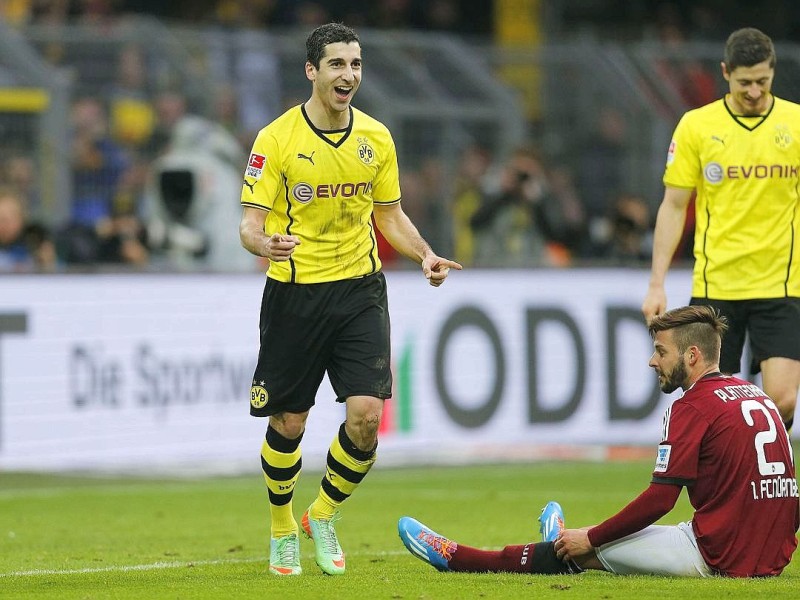 Borussia Dortmund ist auch in der Fußball-Bundesliga zurück auf Erfolgskurs. Eine Woche nach der ernüchternden Schlappe beim Hamburger SV (0:3) setzte sich die Mannschaft von Trainer Jürgen Klopp mit 3:0 (0:0) gegen den 1. FC Nürnberg durch. Wie schon beim famosen Champions-League-Auftritt vier Tage zuvor in St. Petersburg (4:2) präsentierte sich der BVB am Samstag von seiner besseren Seite und rückte auf Rang zwei vor. Vor 80 645 Zuschauern im ausverkauften Signal Iduna Park sorgten der nach dreiwöchiger Verletzungspause ins Team zurückgekehrte Mats Hummels (51. Minute), Robert Lewandowski (67.) und Henrich Mchitarjan (83.) für den verdienten Sieg.