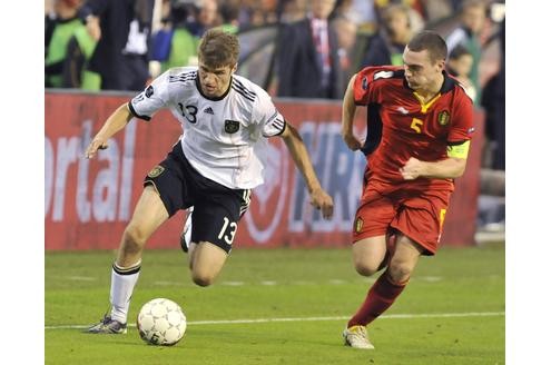 Belgien - Deutschland: Thomas Müller gegen Thomas Vermaelen.