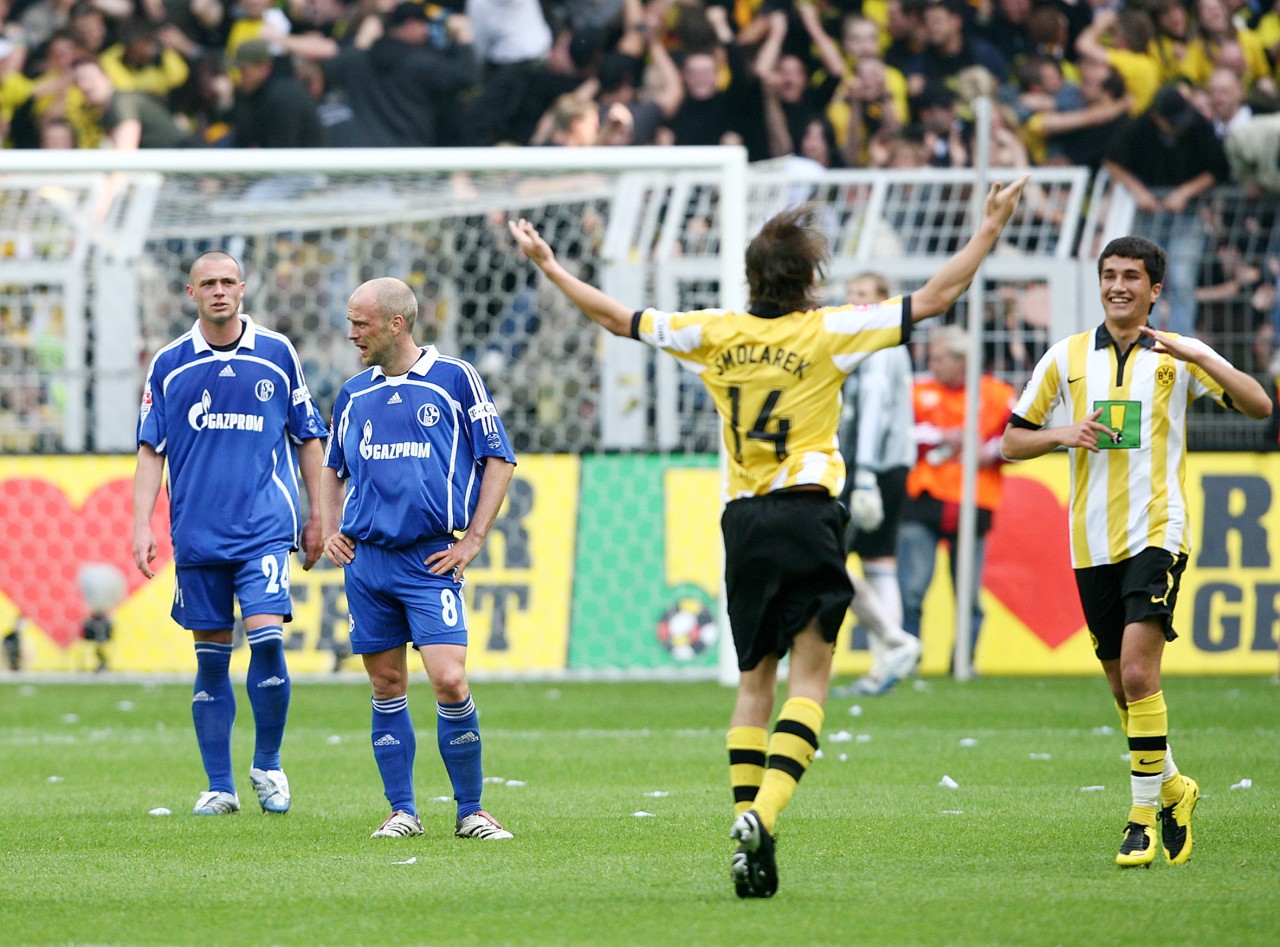 Dortmund jubelt, Schalke unter Schock: Christian Pander (l.) nach dem entscheidenden Tor von Ebi Smolarek.