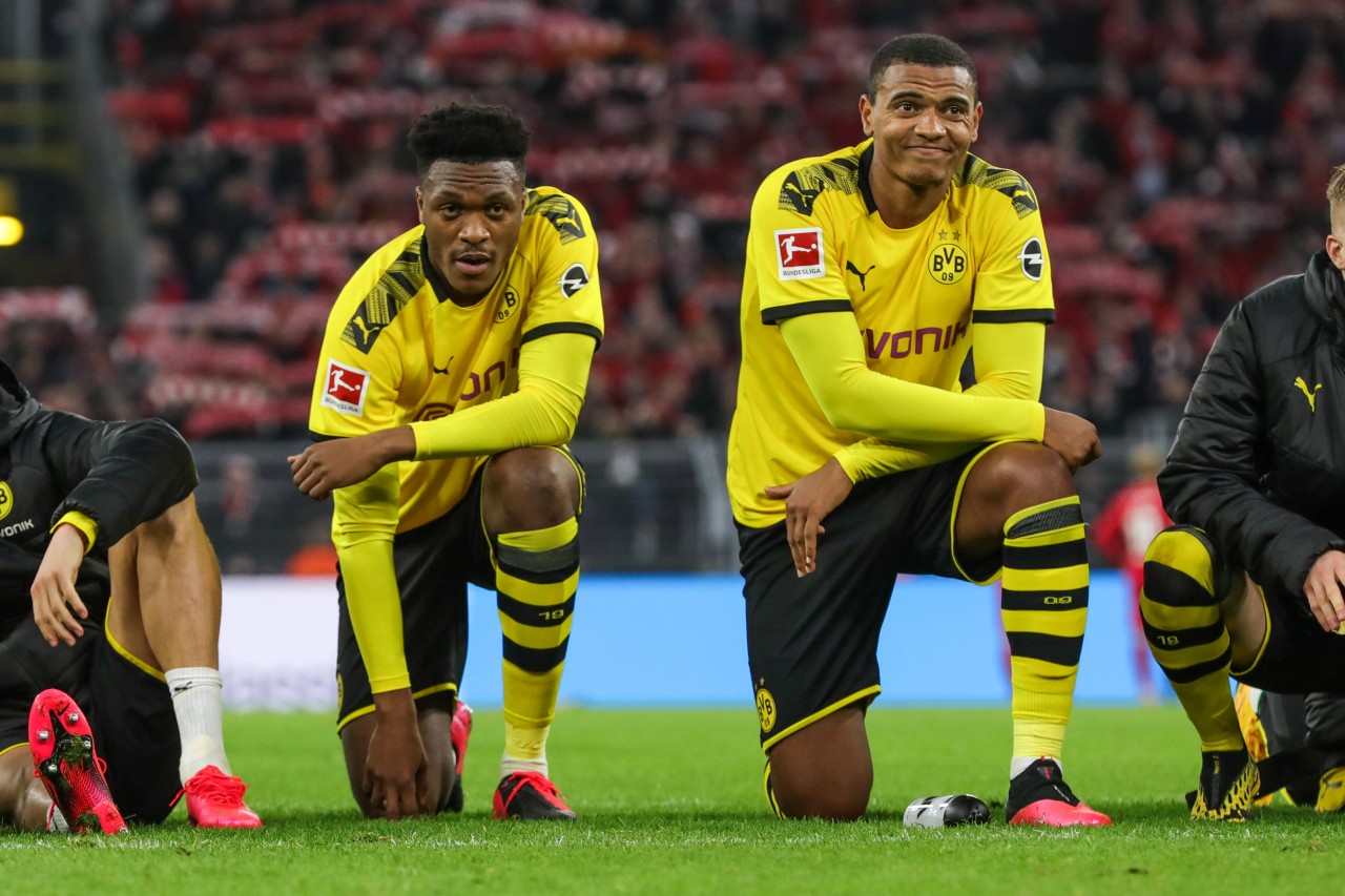 Manuel Akanji (r,) will zu Manchester United. Dan Axel-Zagadou (l.) könnte das verhindern.