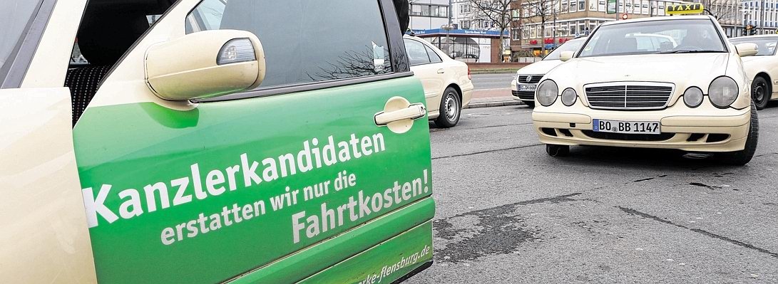 Taxi-Aufdruck mit Werbung für Strom.jpg