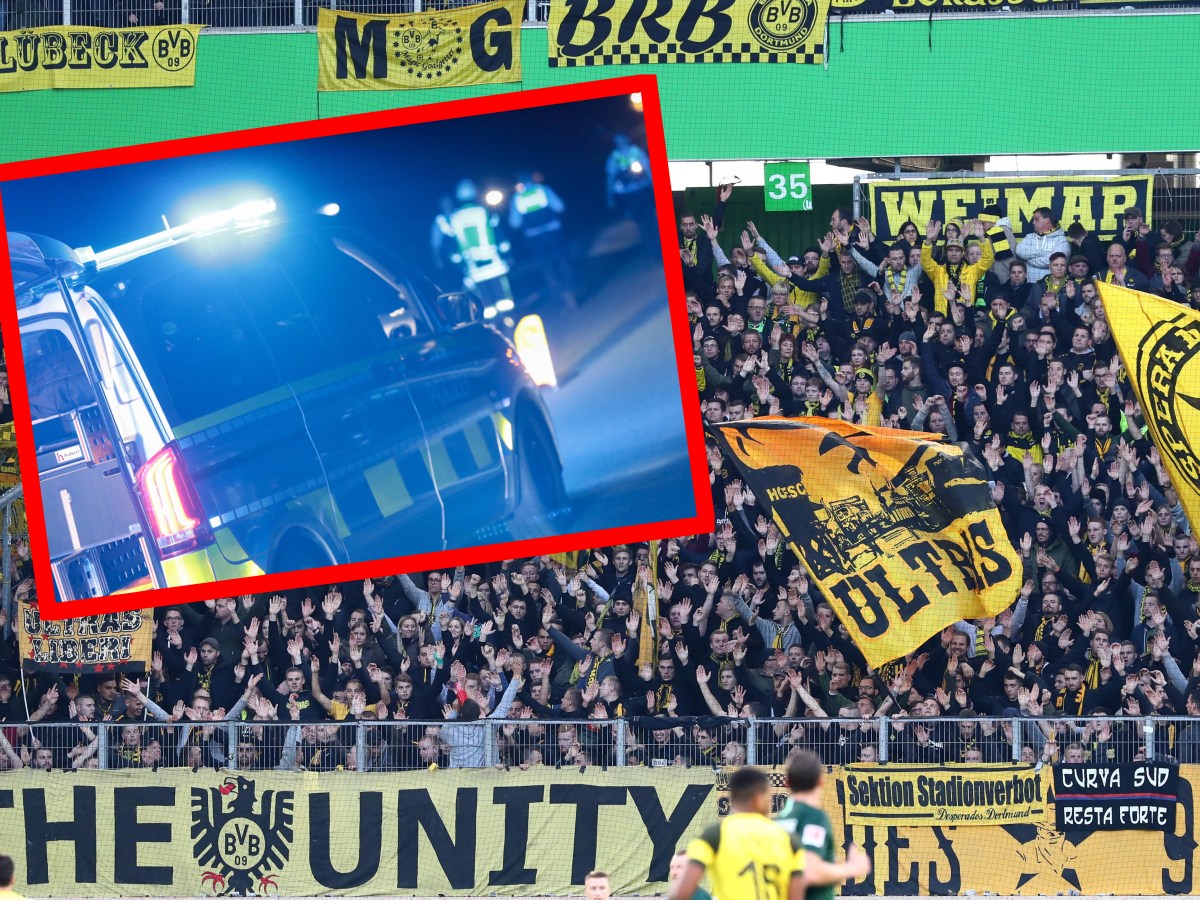 BVB-Fans und ein Polizei-Auto auf der Autobahn.